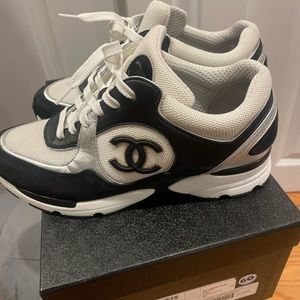 Blk and leather/suede Chanel sneaker size 38.5. Worn 5 times. Great condition